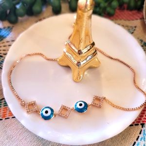 Gold plated adjustable evil eye bracelet (blue)